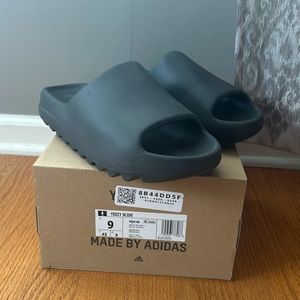 Yeezy by Adidas slides.